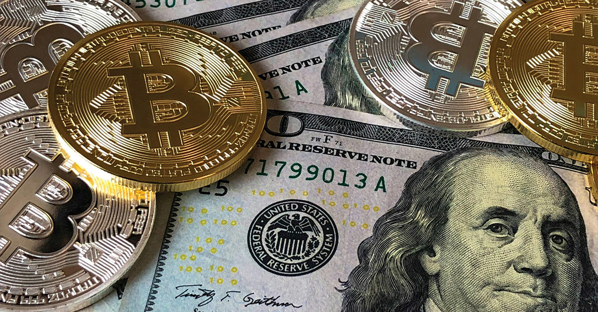 A Note on Fraud: Evertas Policies Are Only Issued Through Licensed Brokers bitcoins and a US hundred dollar bill illustrate finances at risk from fraud